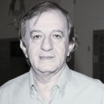 Retrato de Nabil Nahsan, odontólogo pioneiro em Rondonópolis, reconhecido por atuação no Rotary e em projetos sociais voltados à comunidade.